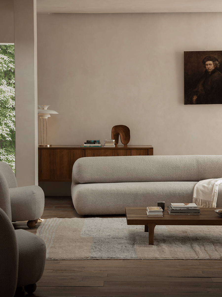 Wave Bouclé Sofa in a stylish living room, with bouclé fabric, wooden accents, and modern interior design.