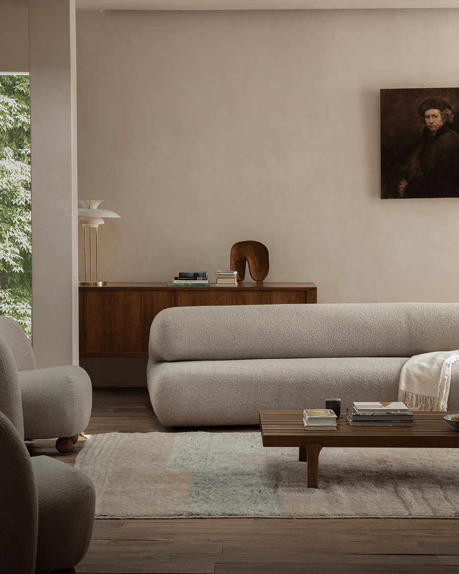 Wave Bouclé Sofa in a stylish living room, with bouclé fabric, wooden accents, and modern interior design.