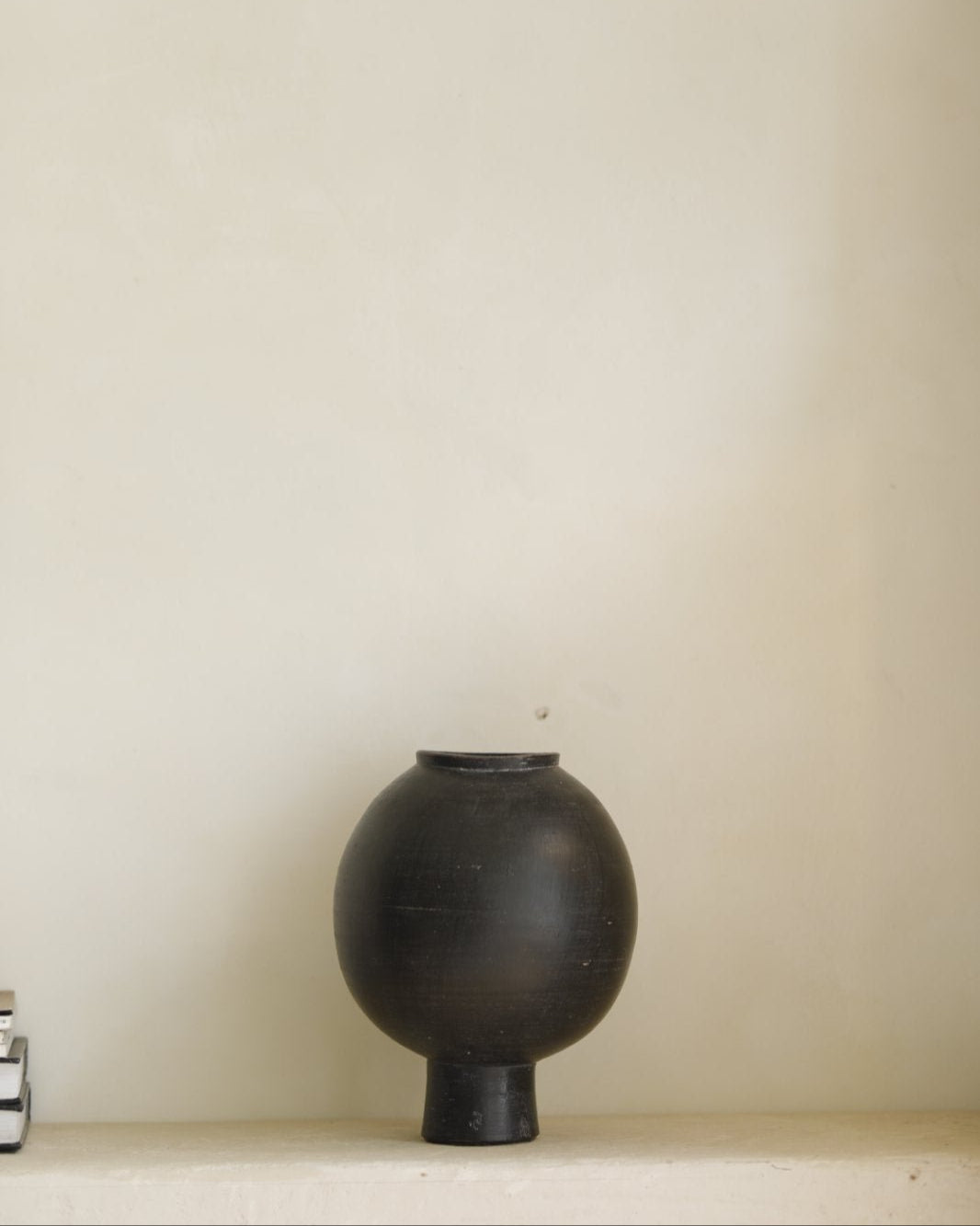 Black ceramic sphere vase, minimalist design, for home decor