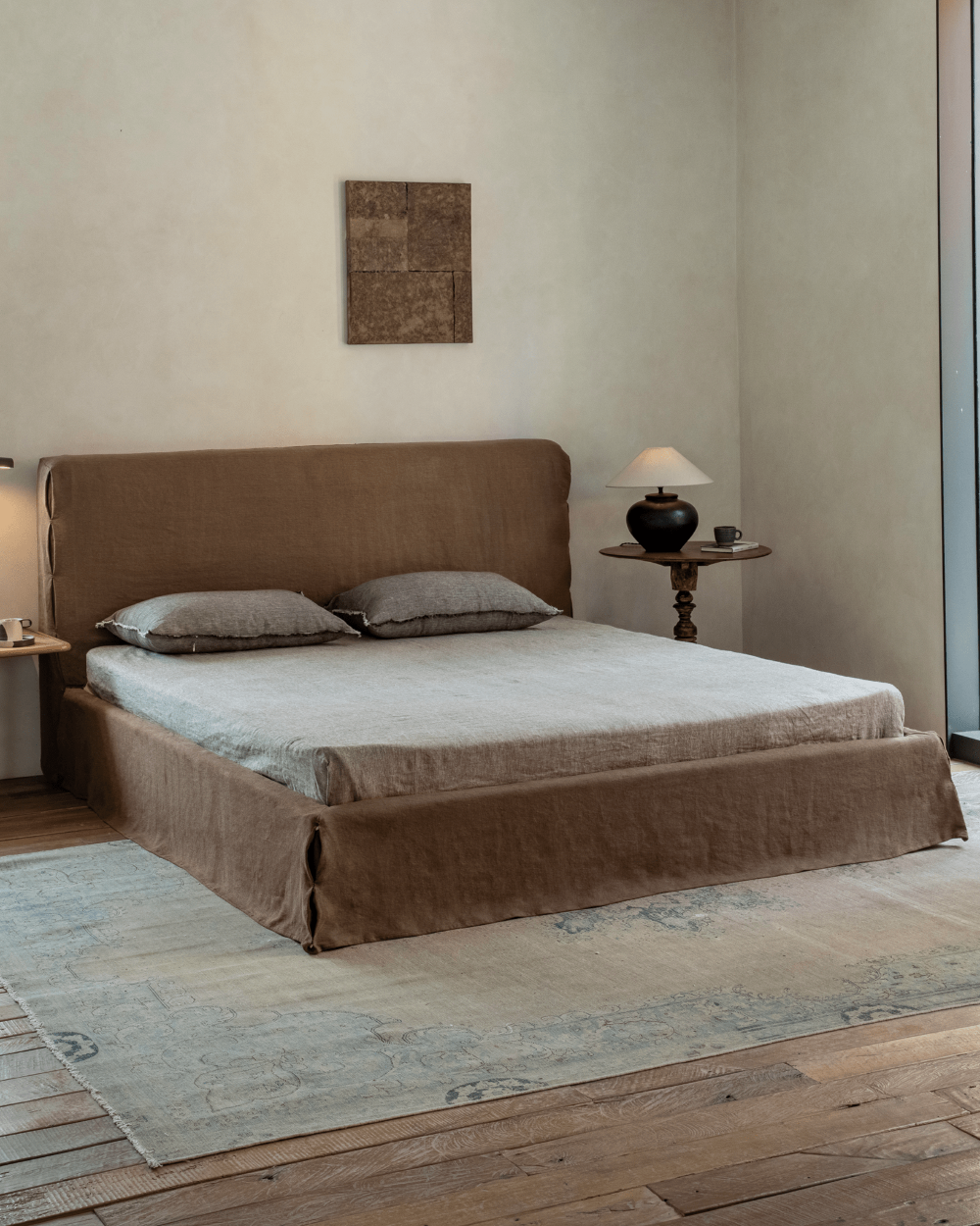 Freya Linen Bed in terracotta linen with linen bedding. Peaceful sleep, minimalist design.