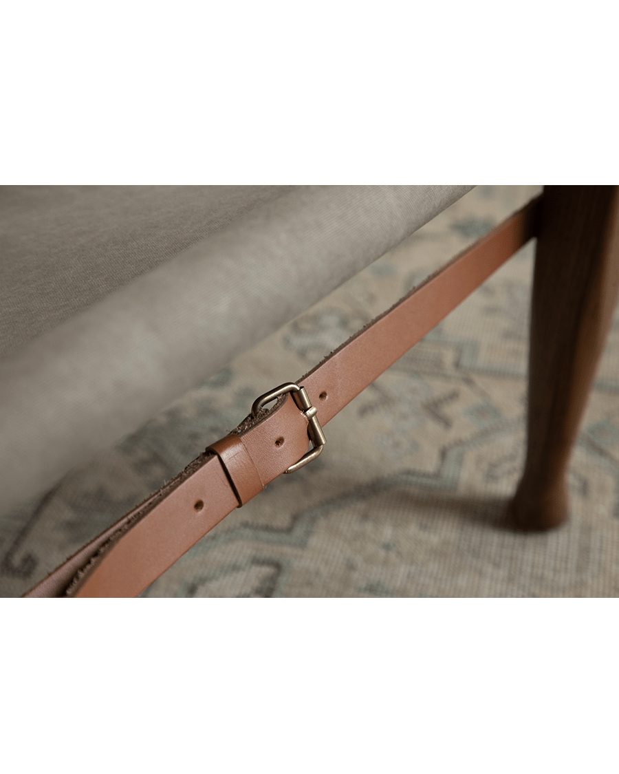 Safari Chair detail: Leather strap with brass buckle on US Red Oak frame, portable design