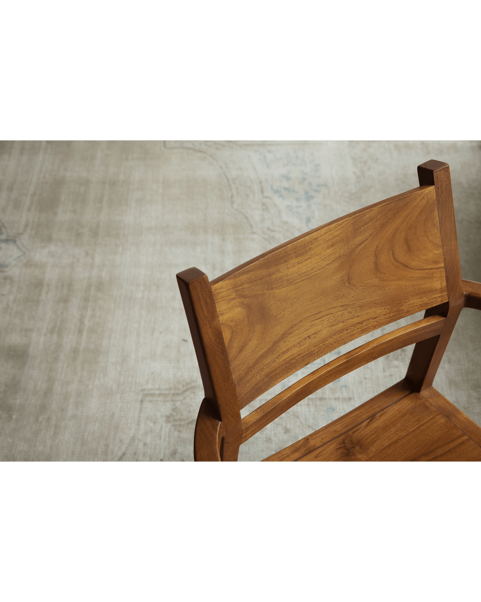 Wooden Hug Chair, close-up of backrest showcasing wood grain and modern design