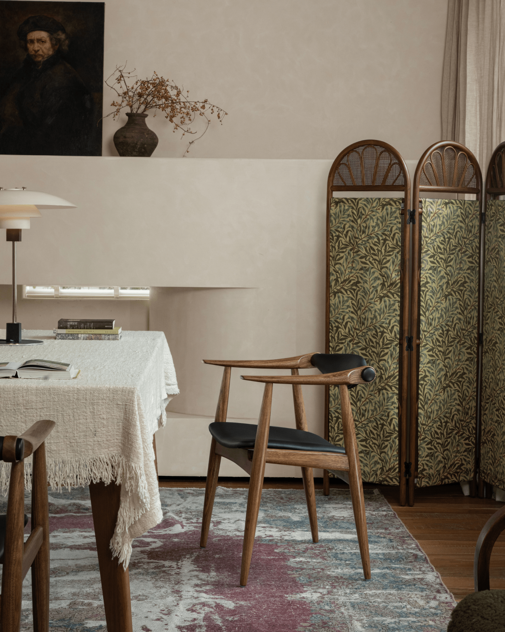 CH34 Yoke Chair in ebony wood and black leather, dining room setting, mid-century modern design