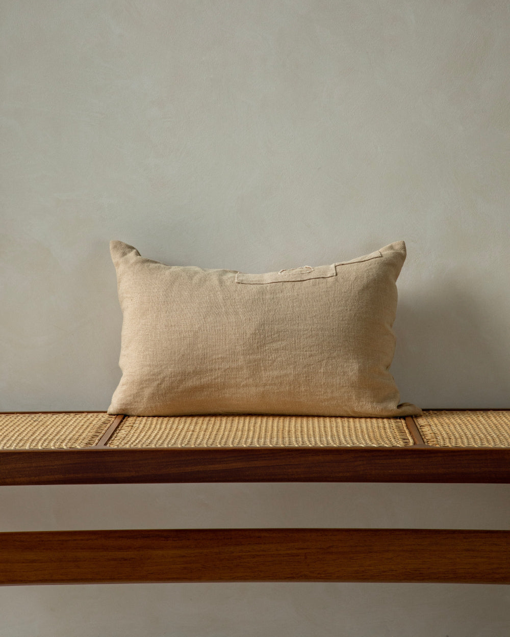 Linora Pillow: Natural yarn-dyed linen cushion with handcrafted details.