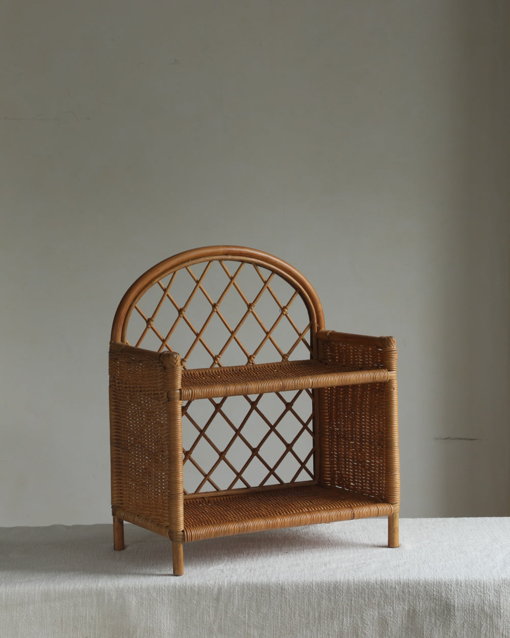 Solana Stand woven rattan organizer with arched top and two shelves