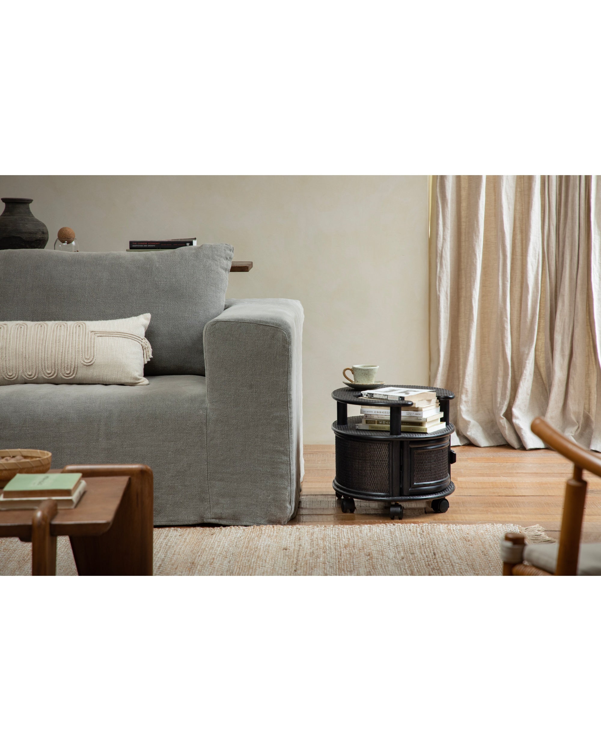 Noa Rattan Wheeled Table