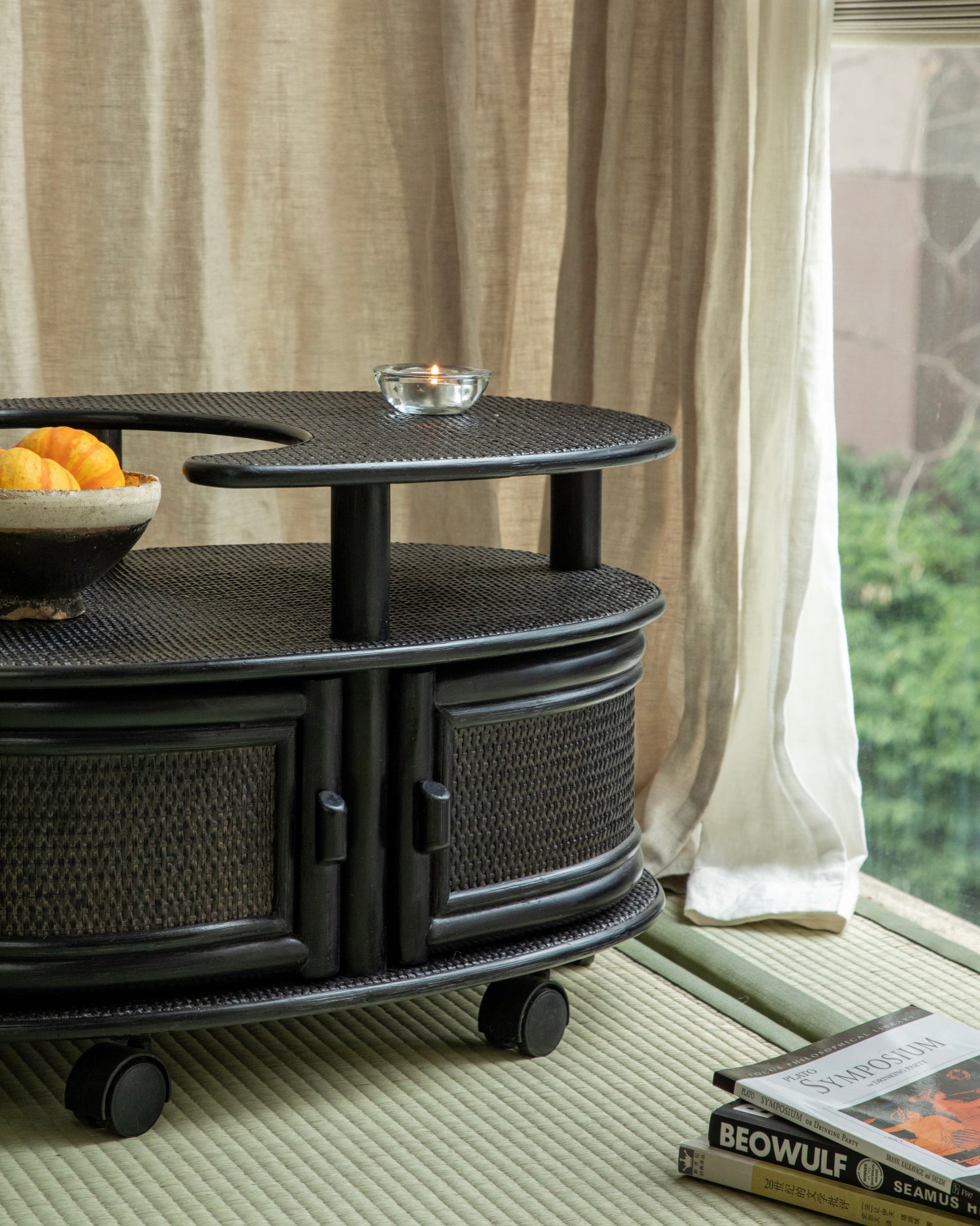 Noa Rattan Wheeled Table