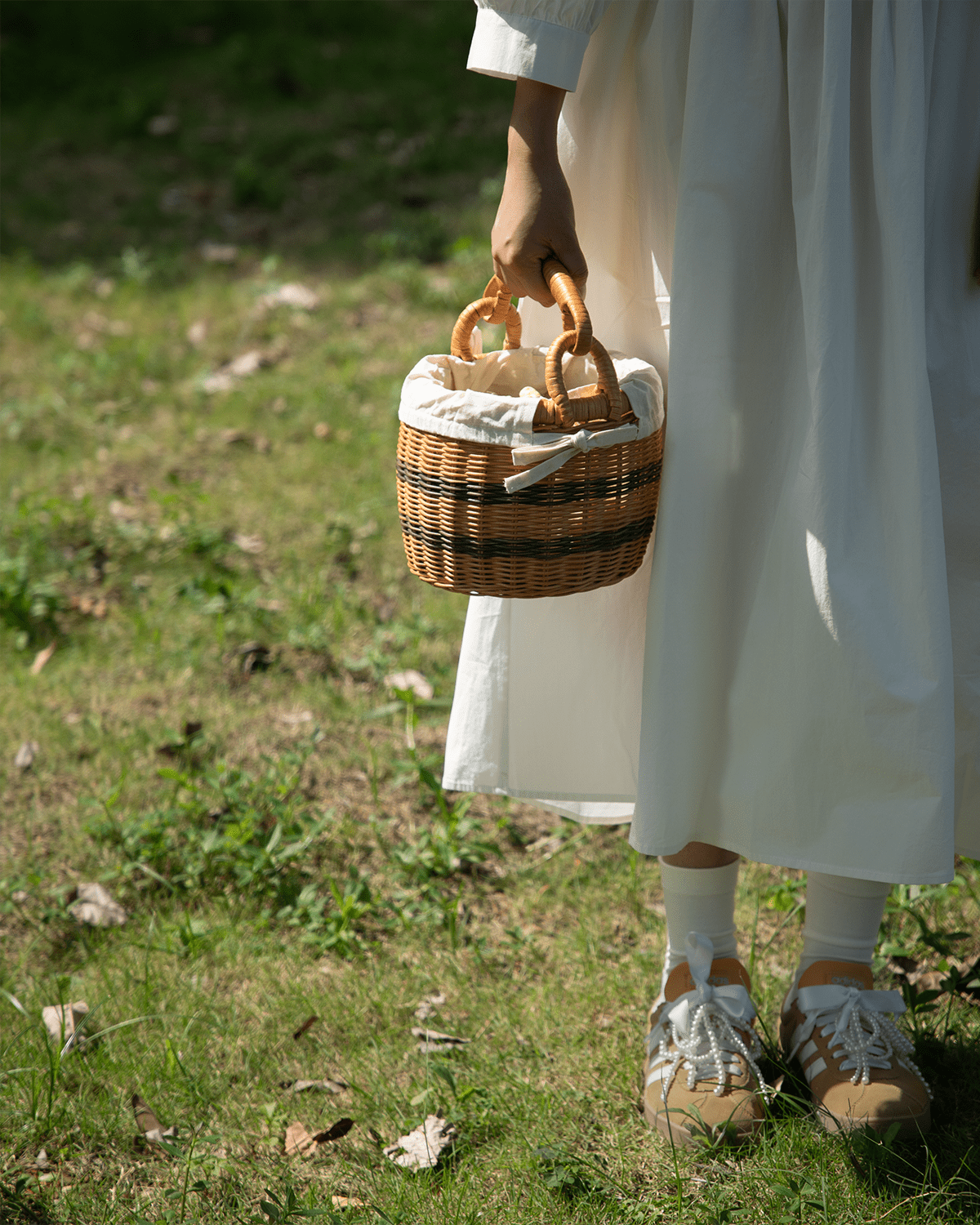 Sunday Picnic Bucket: Handwoven striped rattan basket with cotton lining.