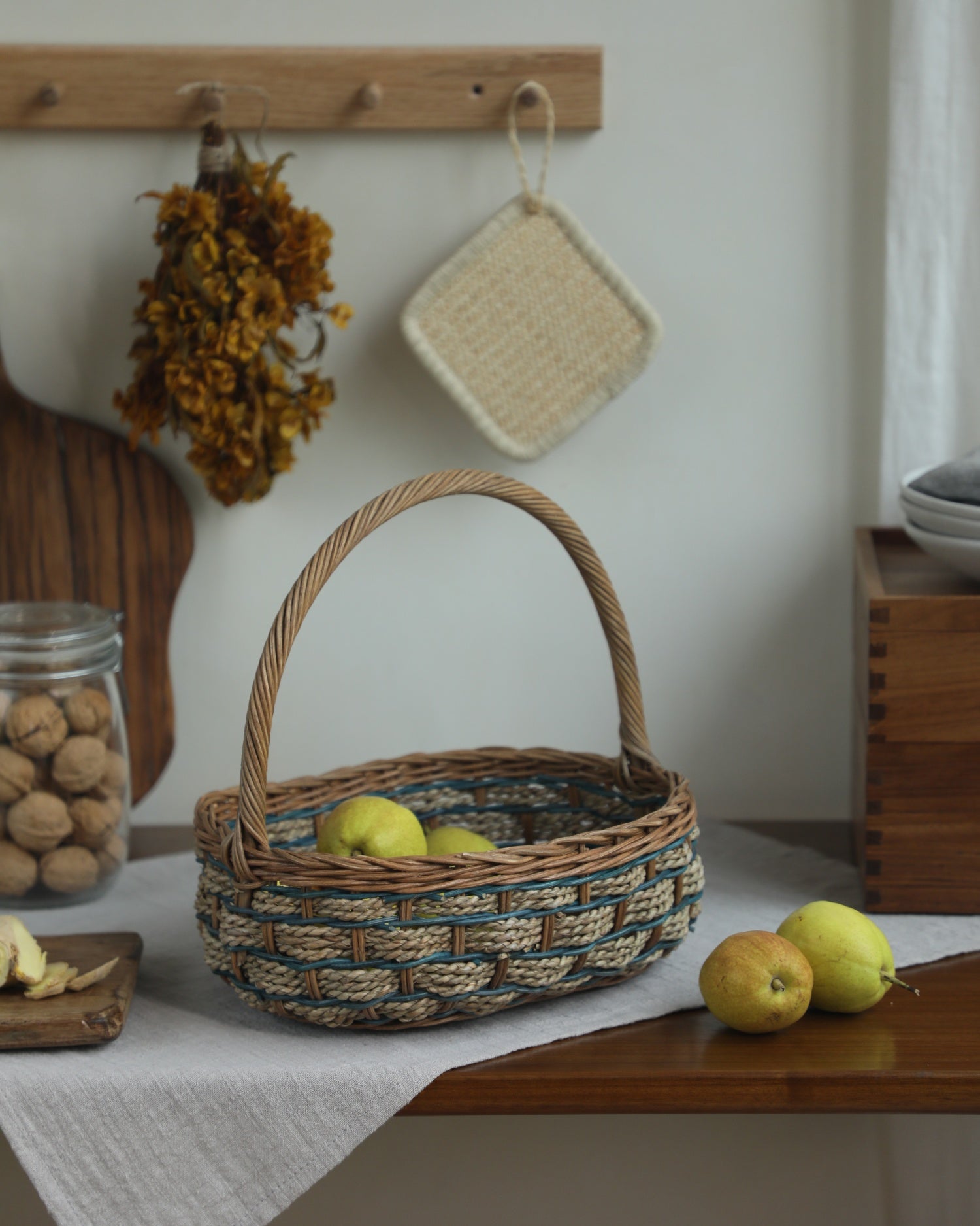 Viney Tote Basket: woven natural & blue rattan, elegant handles, with pears.
