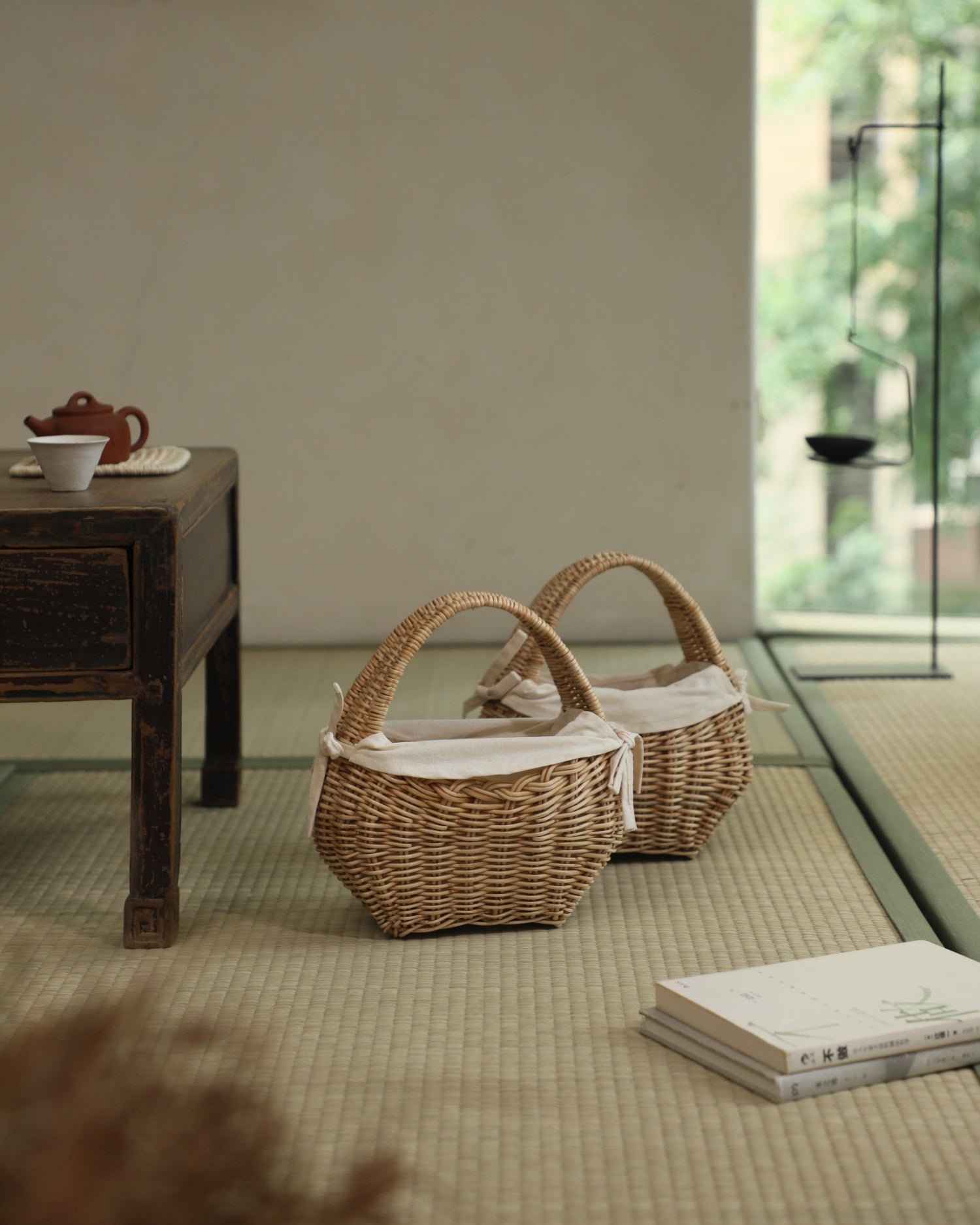 Small Nora Clutch handwoven rattan basket with cream lining and handles
