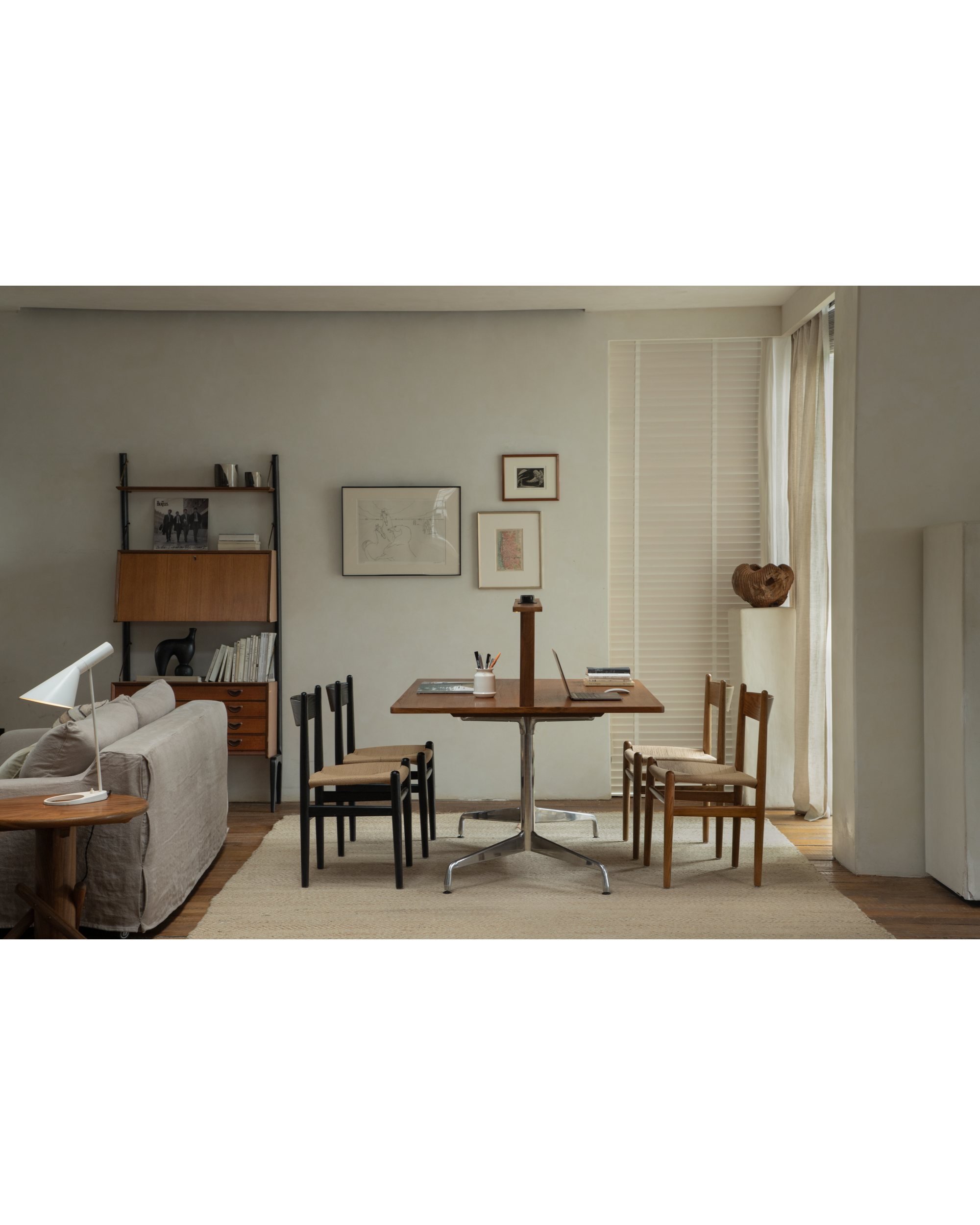 Evan Office Desk with teak top and aluminum alloy base, styled in a contemporary home office.