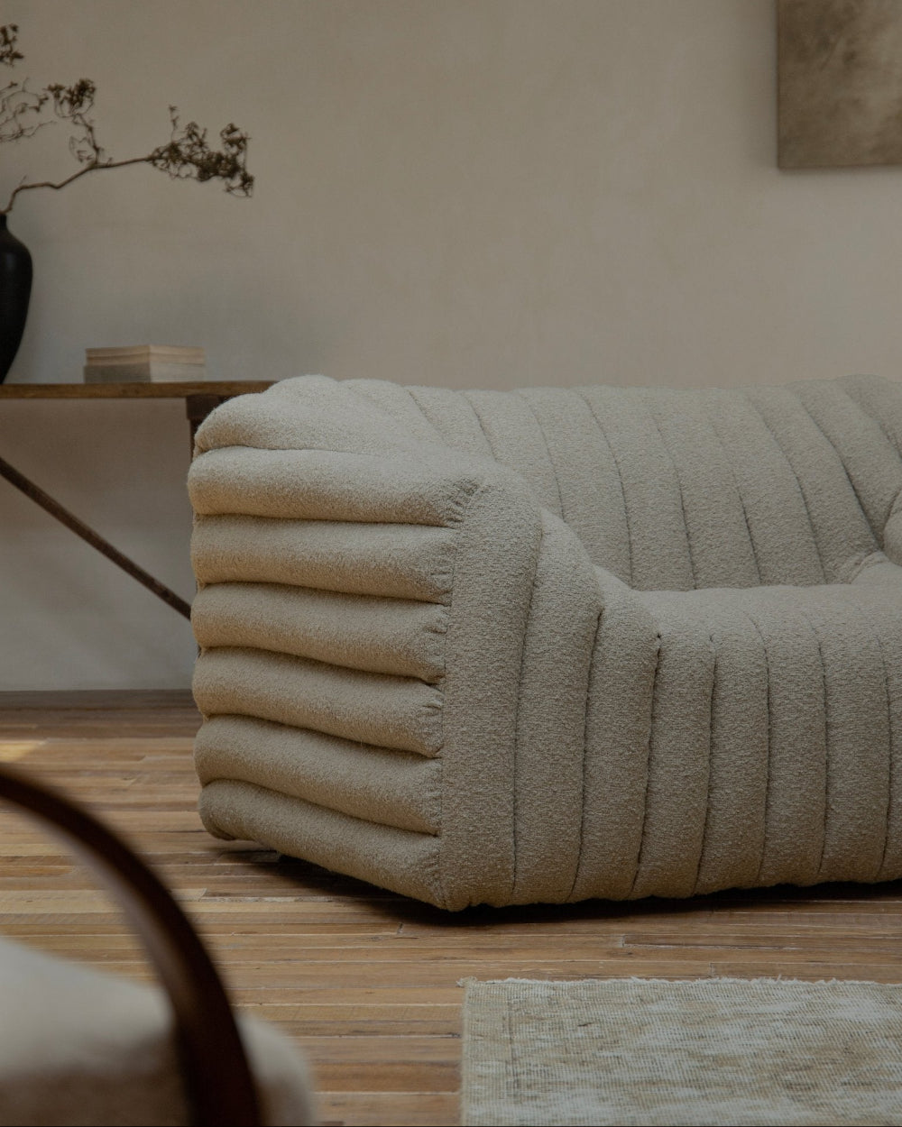 Miche Sofa in beige with vertical ribbed design, accentuating cozy living space with comfortable style