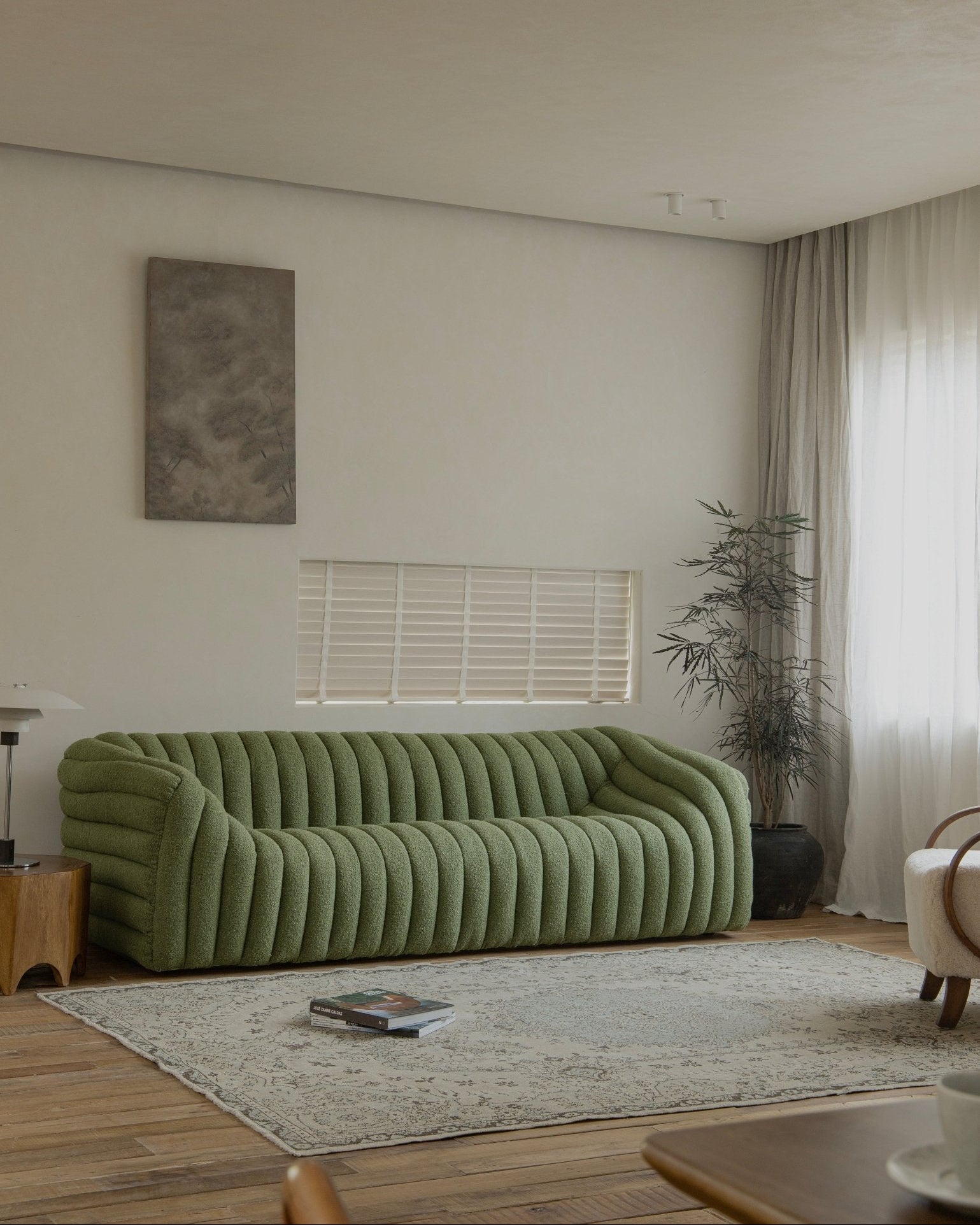 Miche Sofa in green, soft and comfortable, with a cozy living room setting