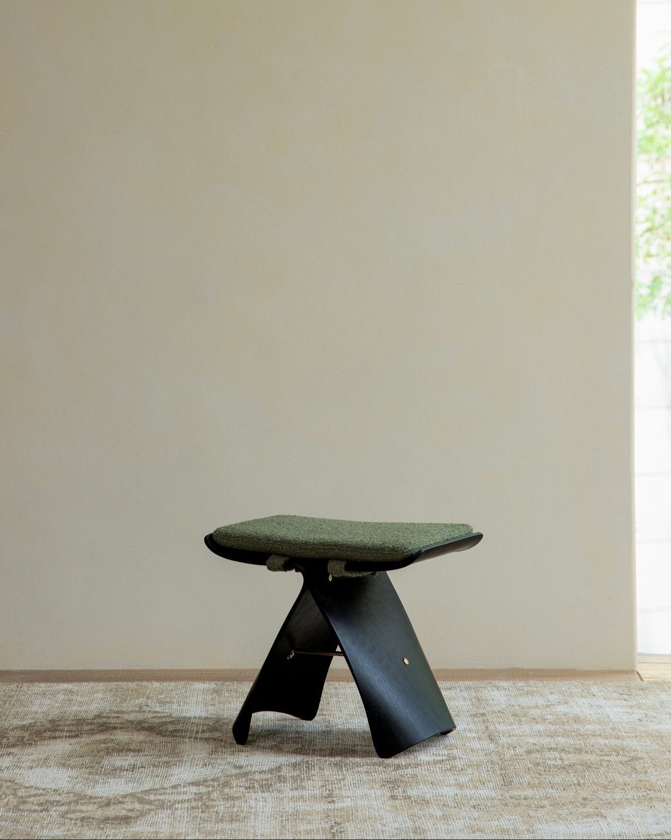 Carbonized Black Butterfly Stool with green cushion, modern design and classic, interior decor piece