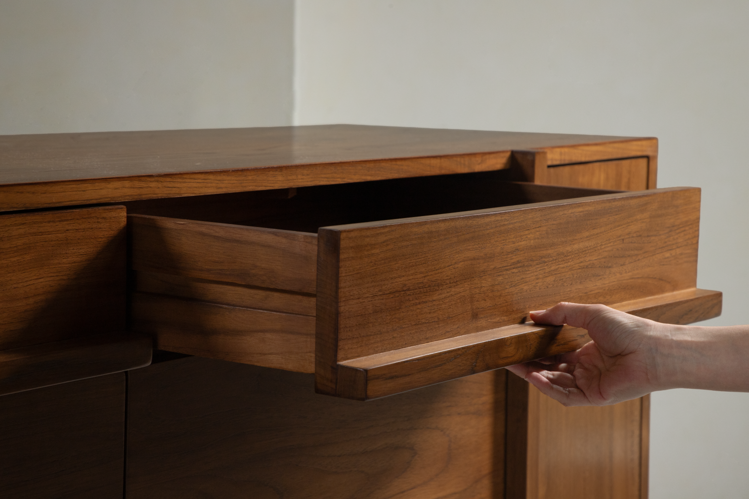 NO.42 Teak Sideboard drawer being opened by hand