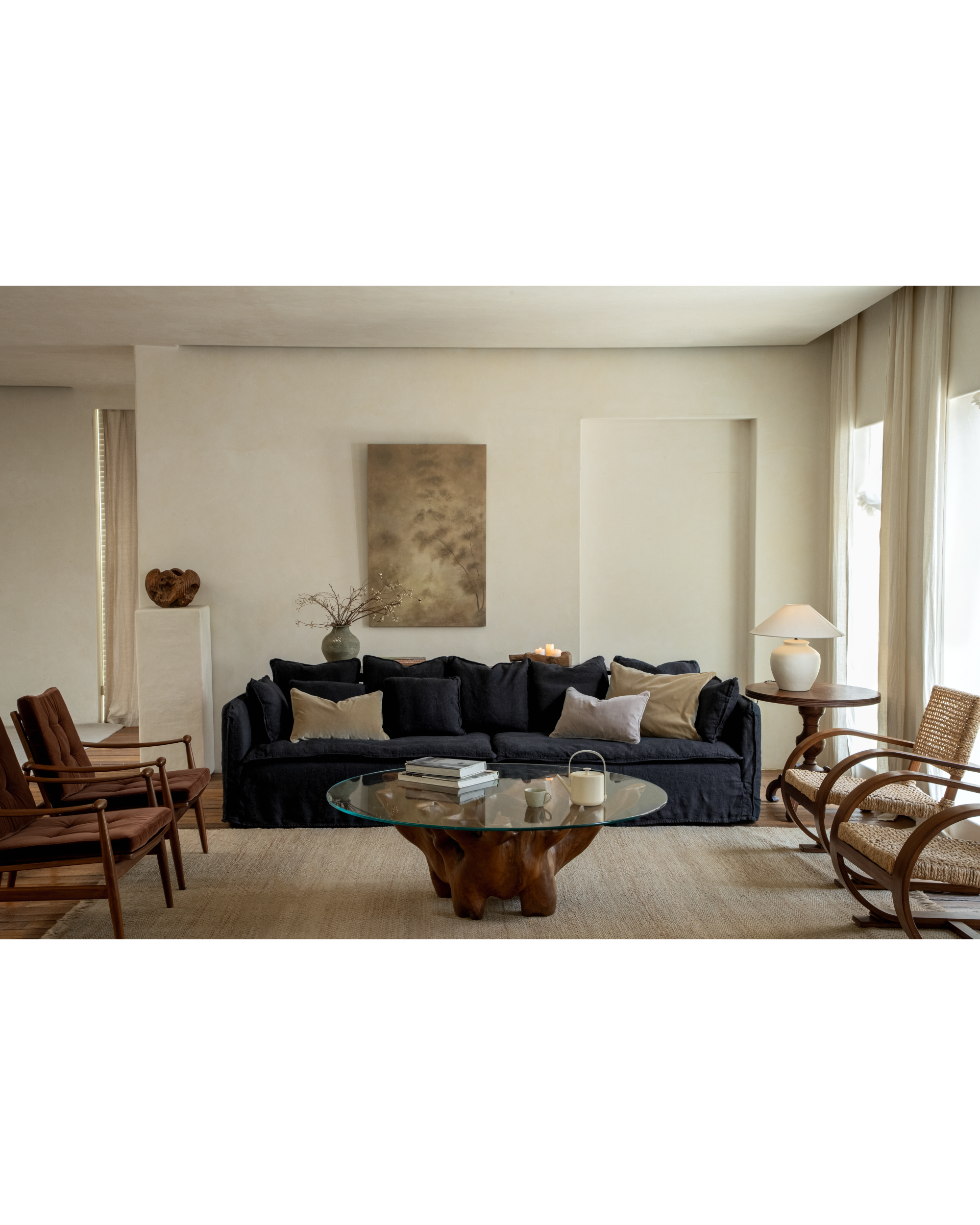 Camille Sectional Sofa in dark charcoal linen, styled with accent chairs and a wood coffee table.