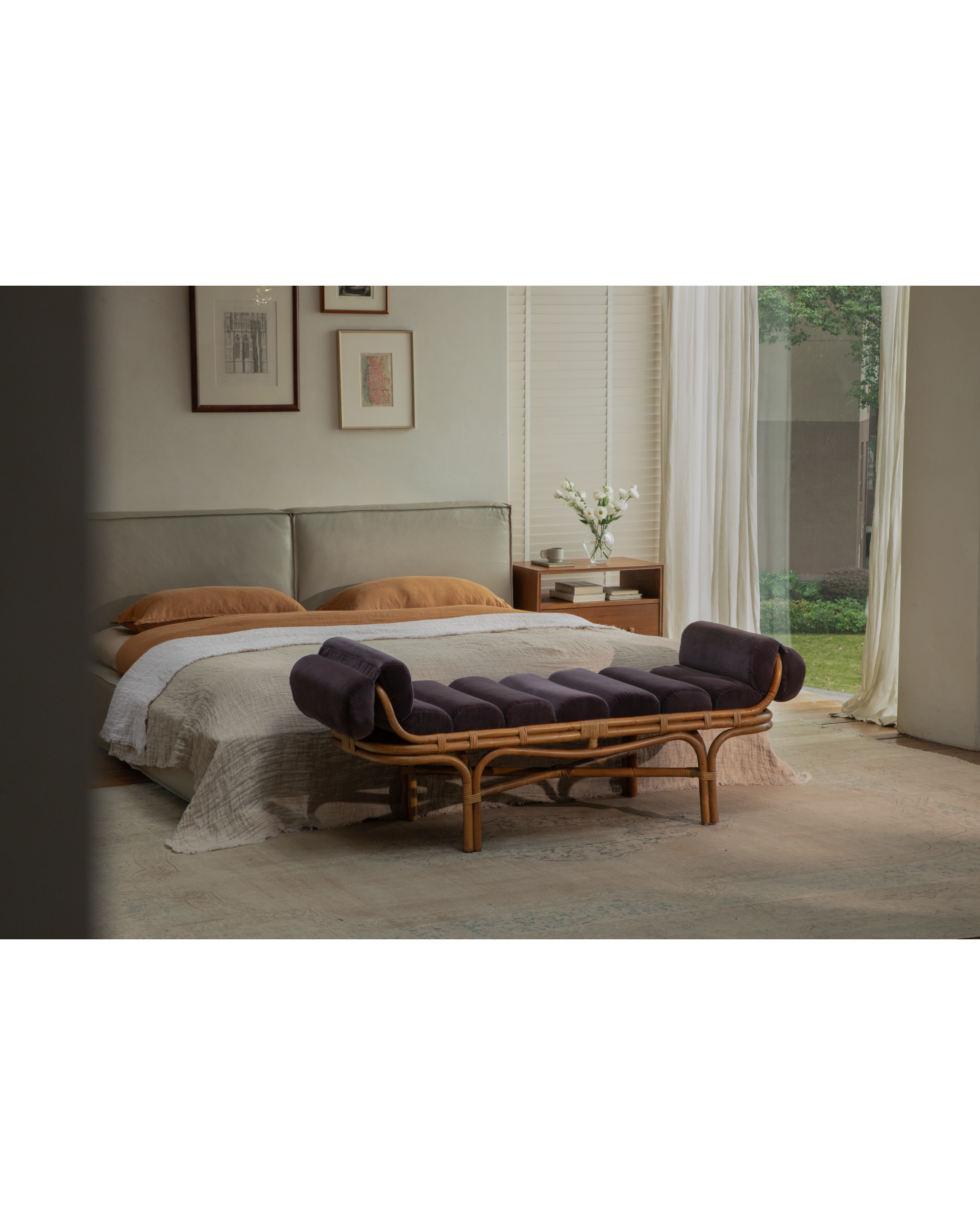 Bridget Bench: Elegant rattan cane bench with plush velvet cushions for bedroom seating.