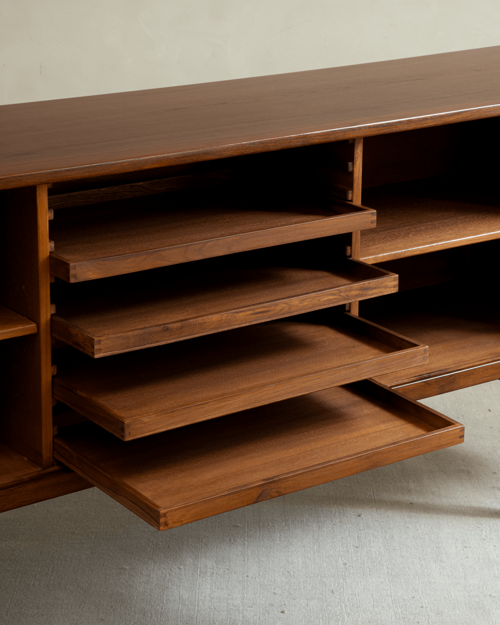 Martin Credenza interior: Teak pull-out shelves and drawers, mid-century style construction.