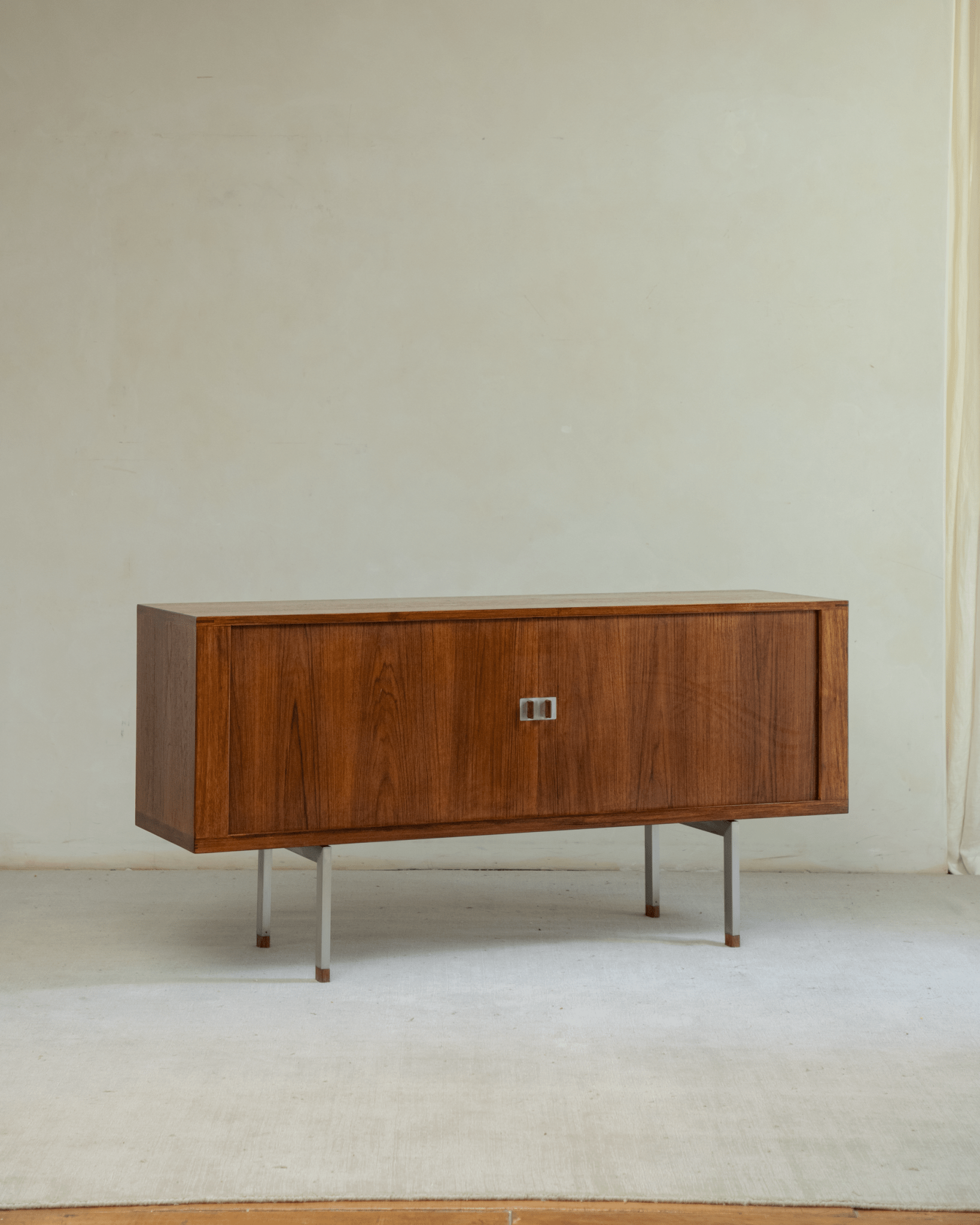 Solid teak Martin Credenza with mid-century roller shutter doors