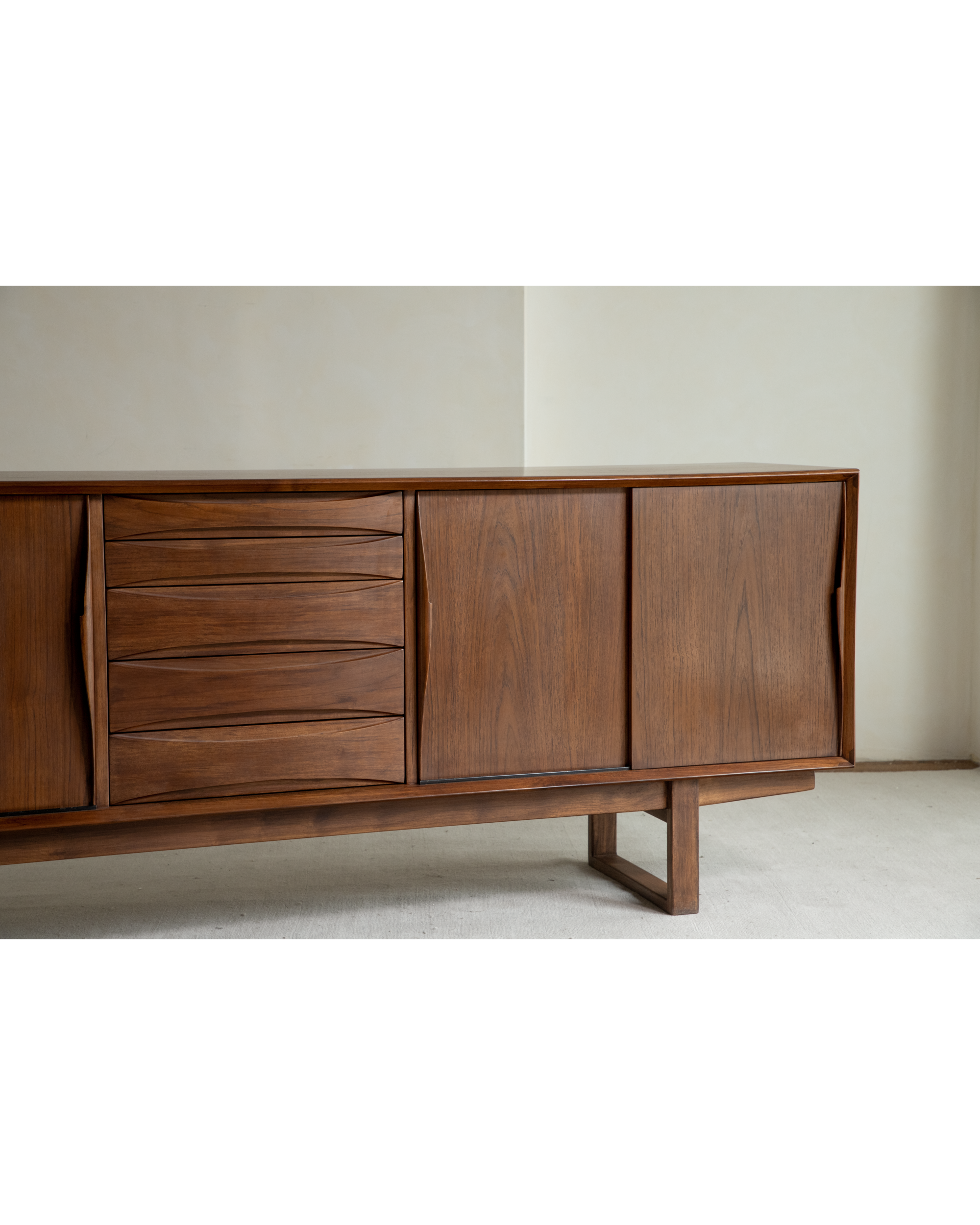 No.454 sideboard with carved drawers and sliding doors, mid-century modern wood design.