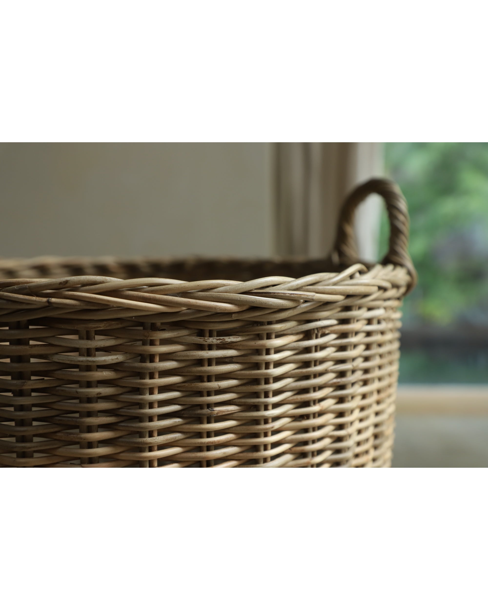 Aria round hand-woven rattan storage basket with handle