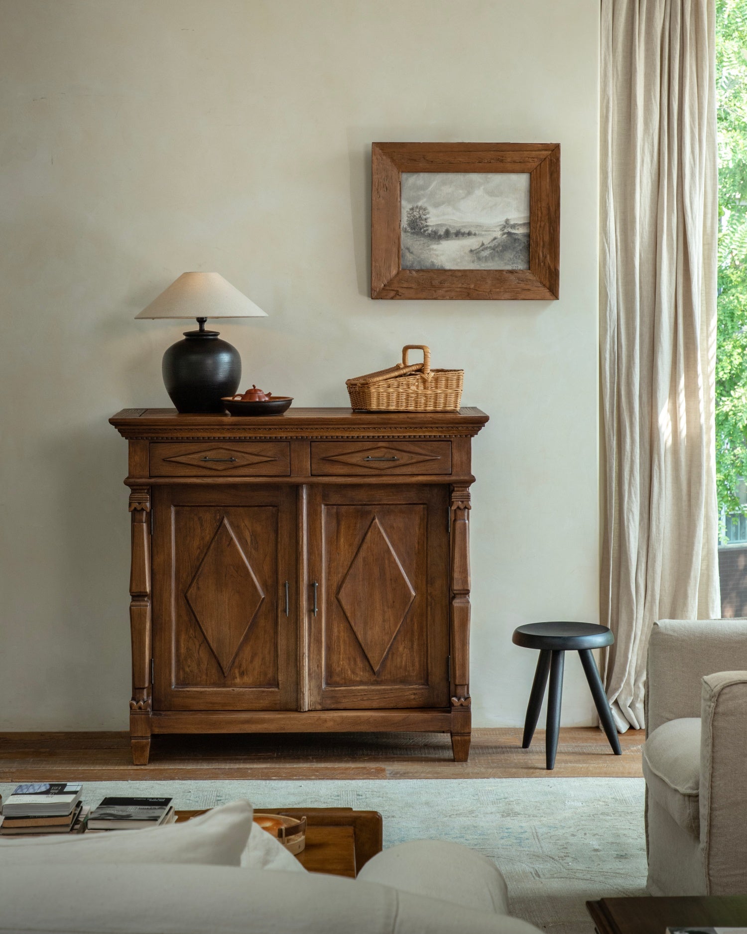 Victoria Teak Cabinet with antique finish, brass handles, and carved details