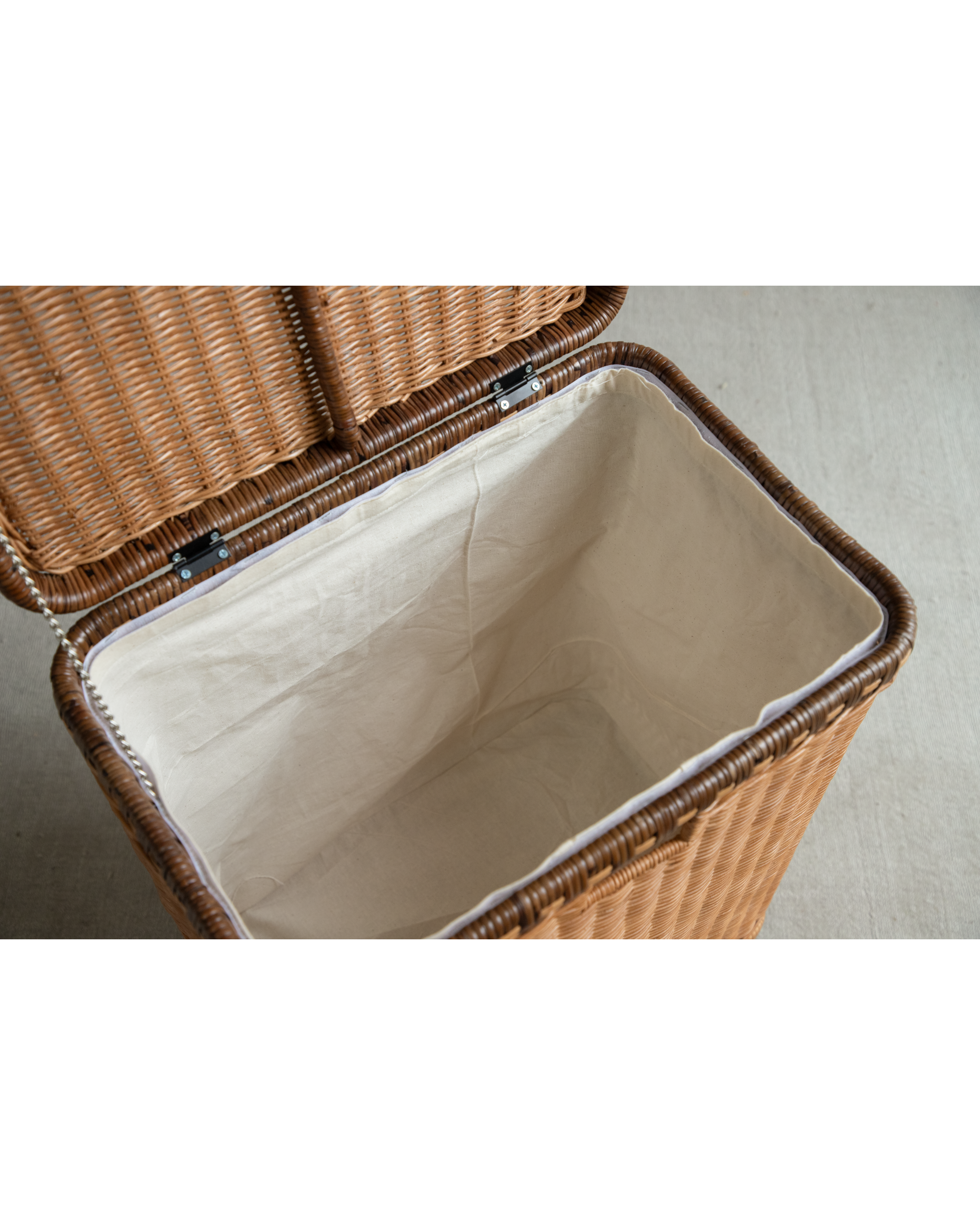 Milo Rattan Laundry Cart: open view of woven Indonesian rattan with lined interior.