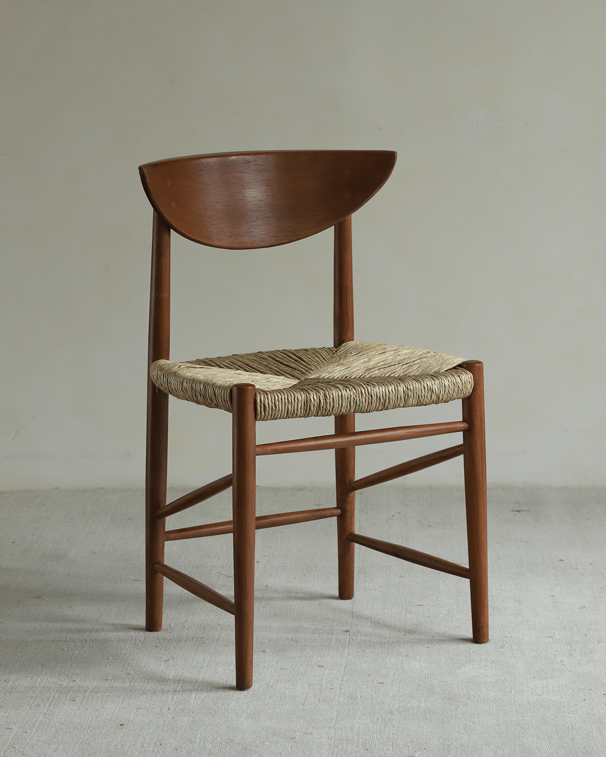 Margaret dining chair: solid teak frame, handwoven paper cord seat.