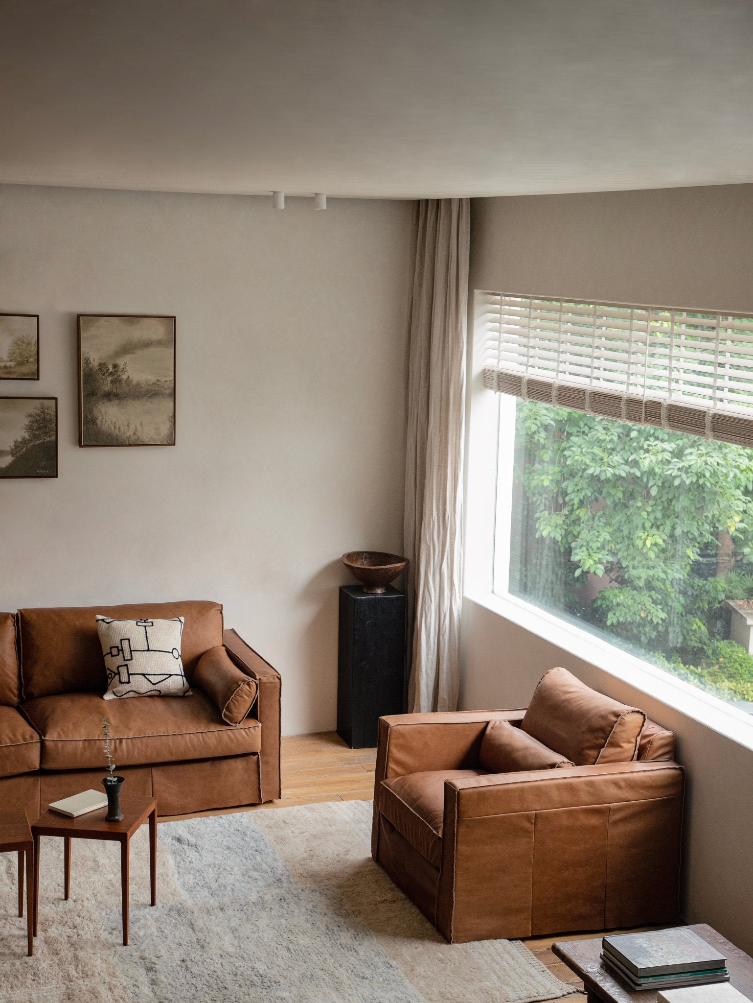 Brown Skirt Leather Sofa and Armchair in Modern Living Room