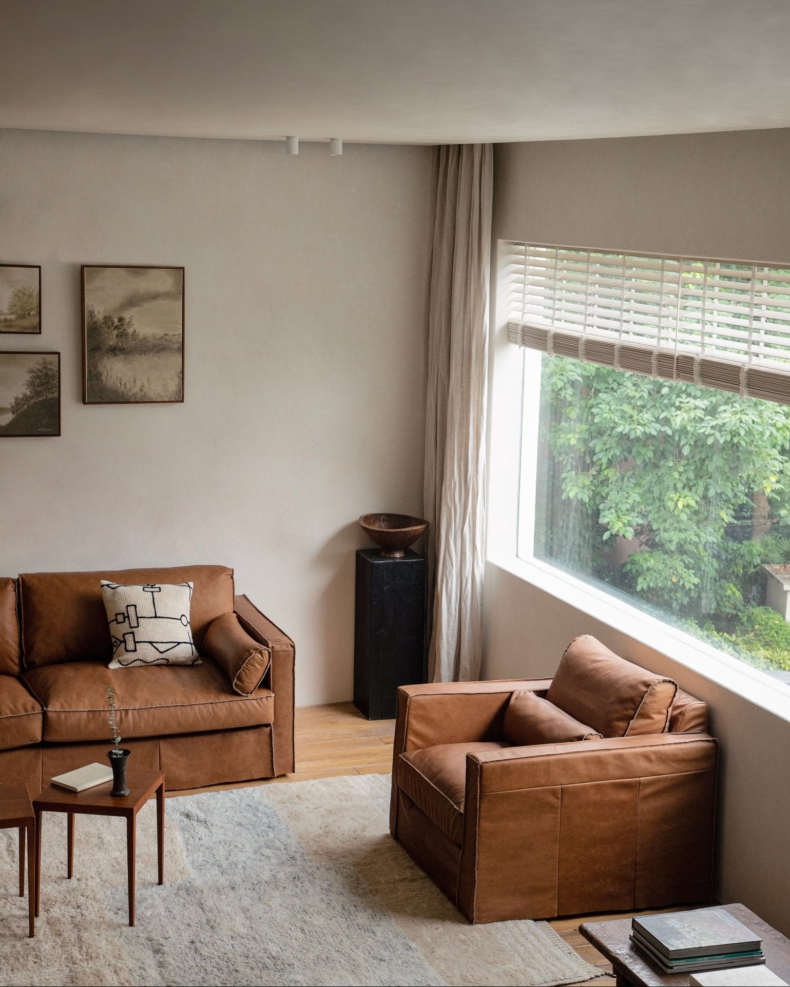 Brown Skirt Leather Sofa and Armchair in Modern Living Room
