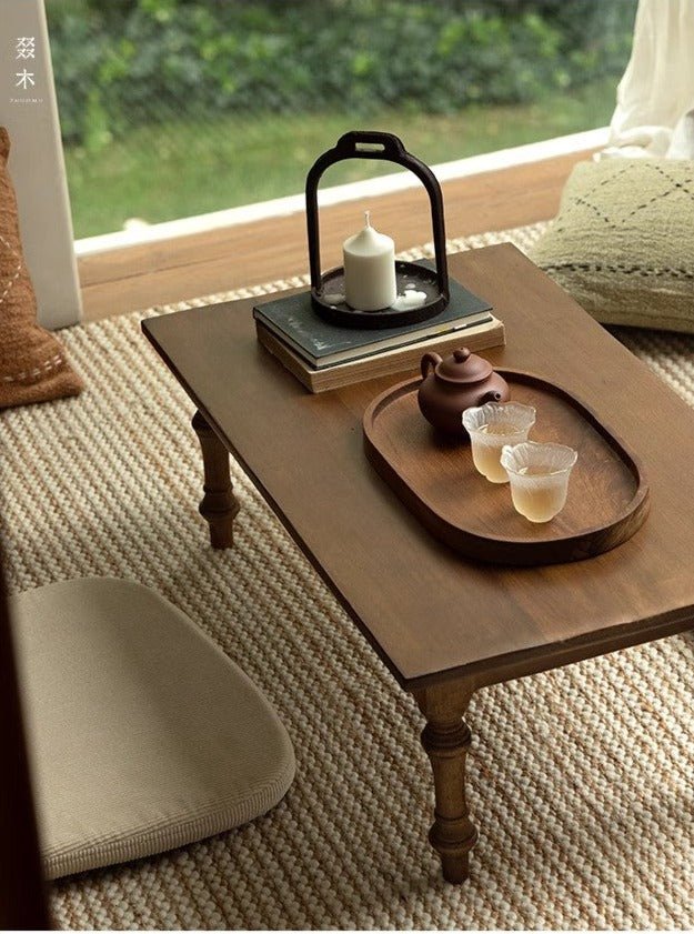 Reclaimed wood Tatami Tea Table with tea set, candles and books, Wabi-sabi style for serene tea time