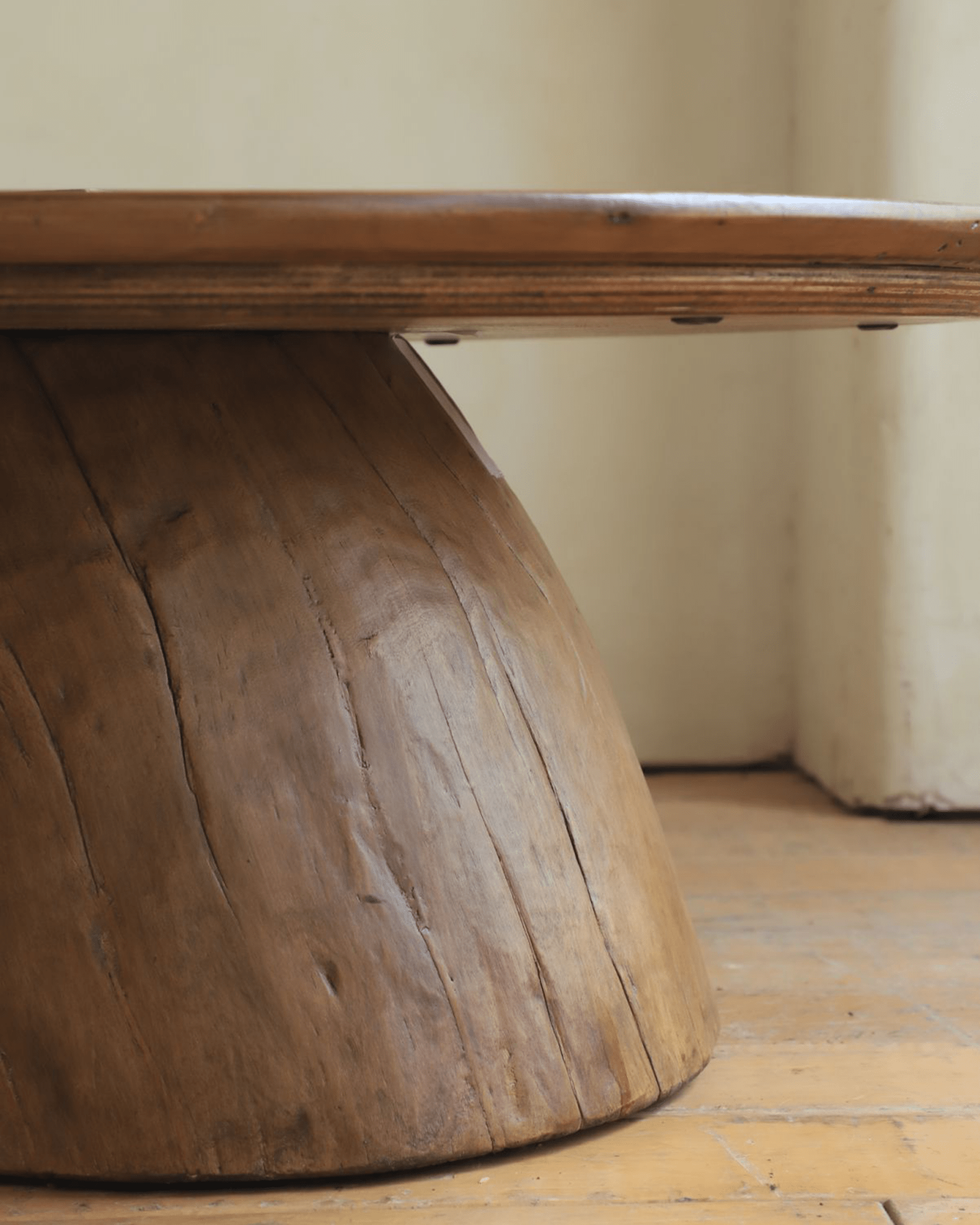 Alva Side Table detail showing natural wood base and tabletop, distorted organic design.