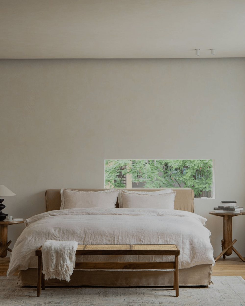 Freya Linen Bed in a serene modern bedroom. Natural linen bedding and wooden furniture for peaceful sleep.