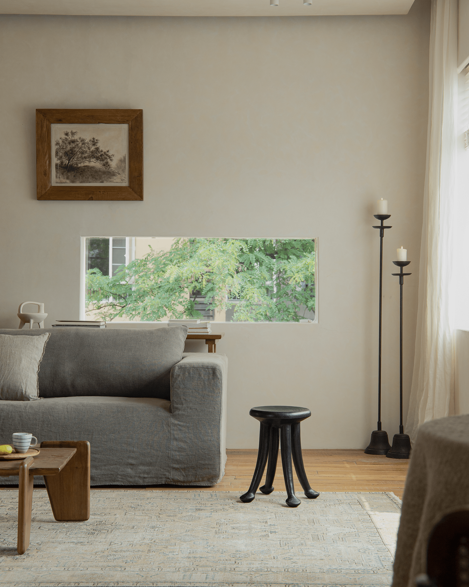 Sploot Stool in modern interior, wooden stool with three legs, Samanea saman wood, black finish, modern living room decor