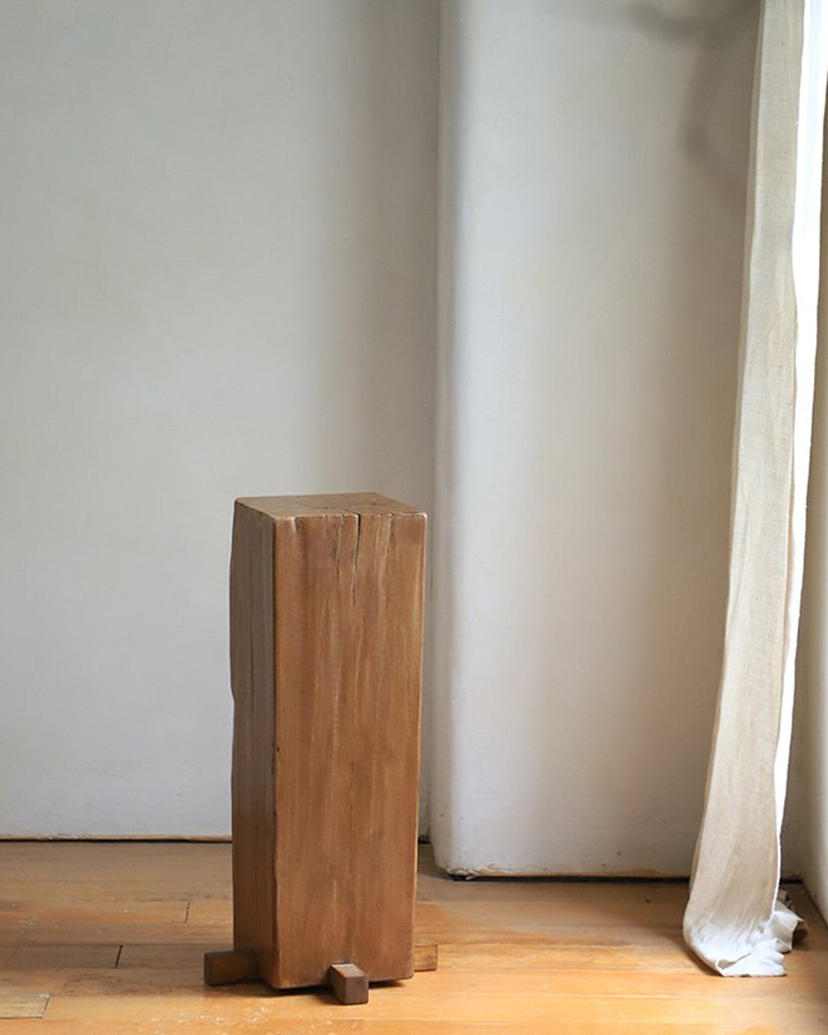 Rustic wooden pedestal, organic interior design, natural aged wood texture, timeless simplicity, square pillar