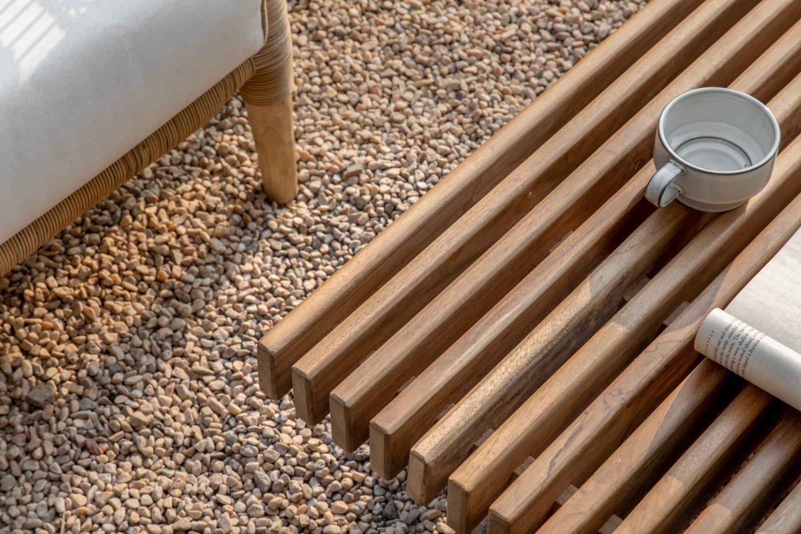 ZM Daybed Coffee Table, teak wood with slatted top, cup and book on pebble base