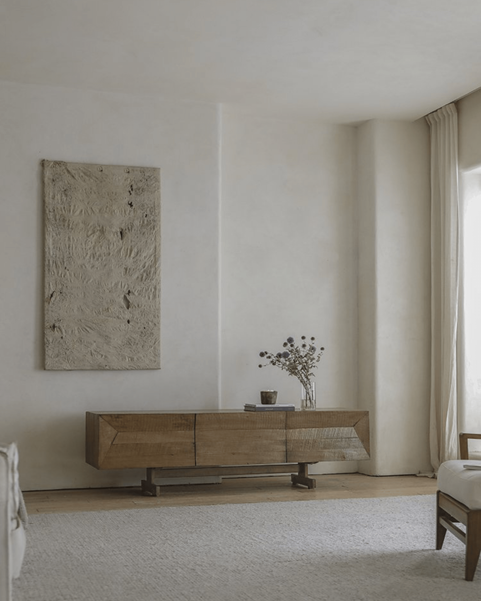 No.3 Sideboard in reclaimed wood with geometric panels, modern design, in a neutral-toned room.