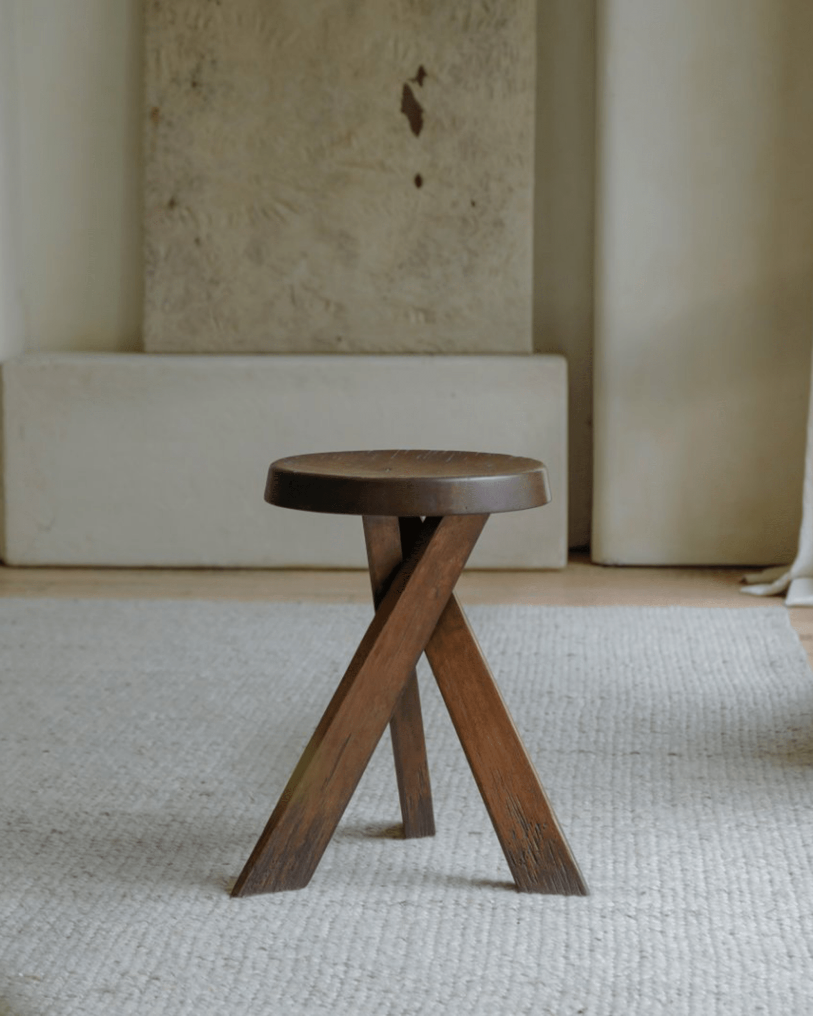 Solid wood French stool in natural finish, round seat and X-shaped legs for modern home decor