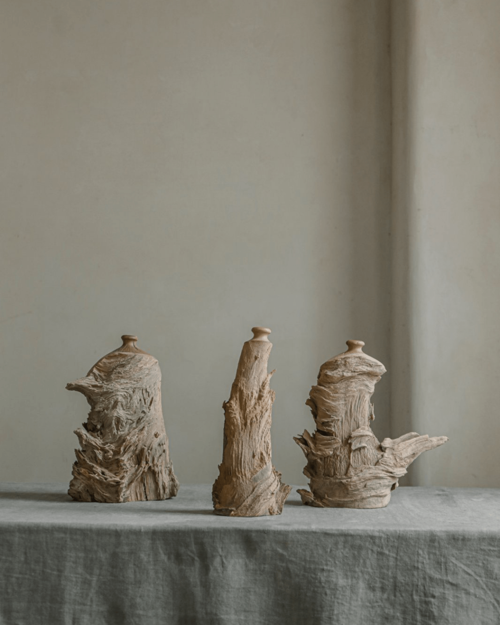 Handcrafted wooden wavy vases in various shapes and sizes for home decor