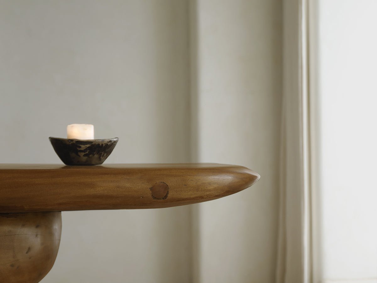 Mesa Console Table, Samanea saman wood with a lit candle, natural finish, modern decor