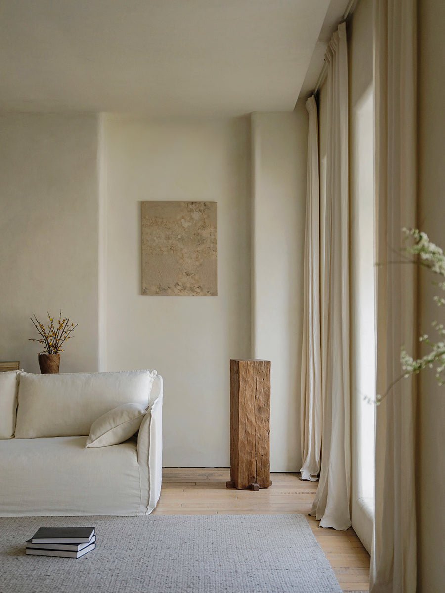 Rustic wooden pedestal, organic interior design, natural wood texture, aged appearance, neutral tones, timeless simplicity