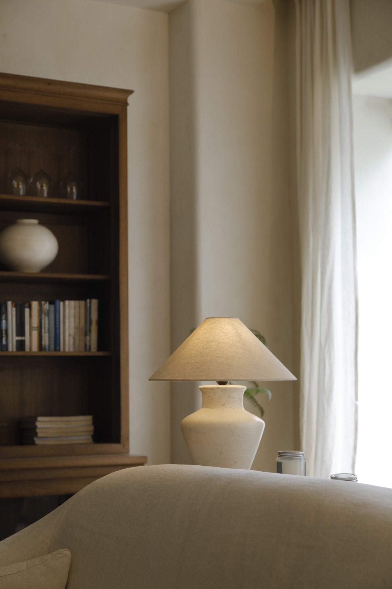 Cream clay base short neck lamp with linen shade, modern design