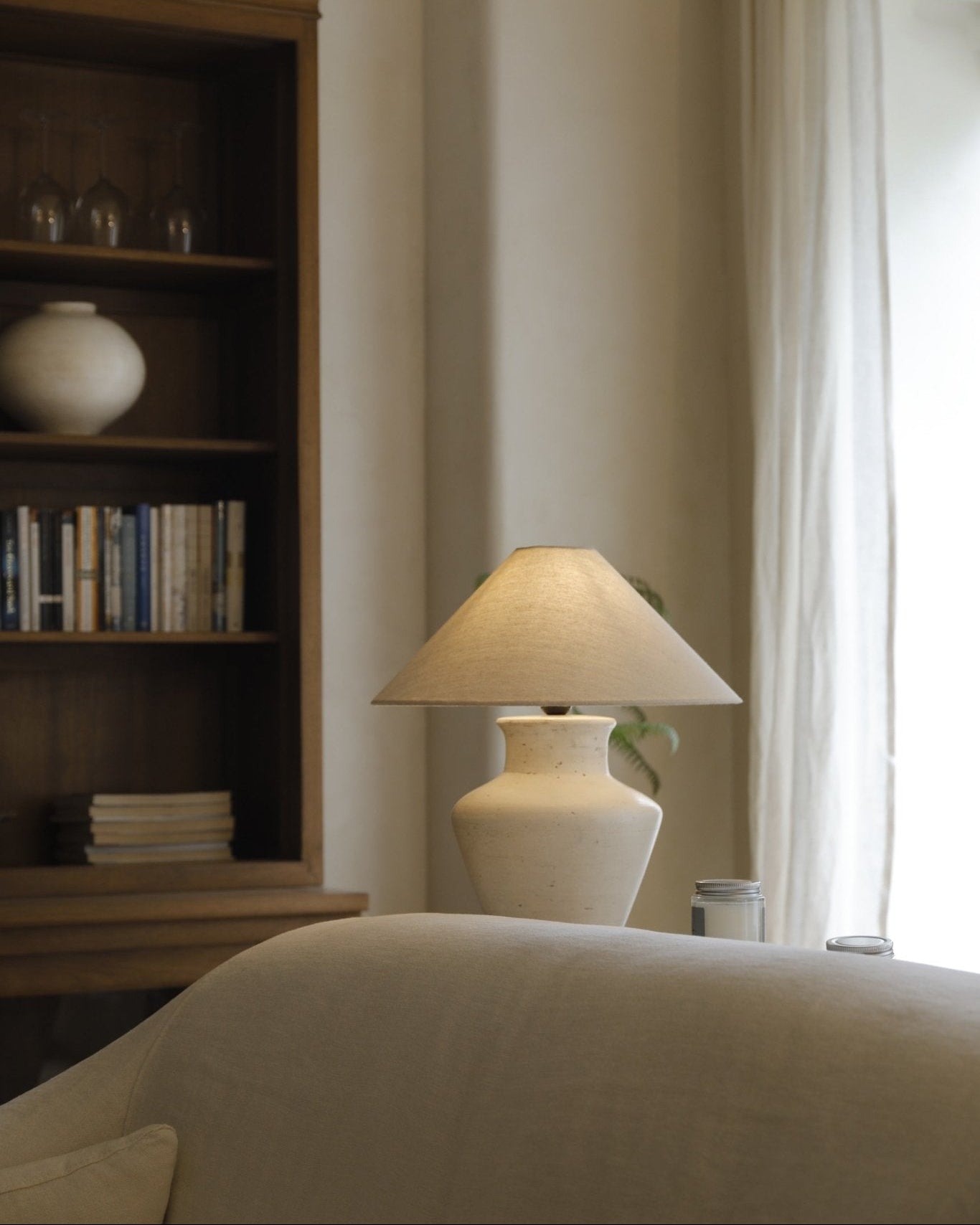 Cream clay base short neck lamp with linen shade, modern design