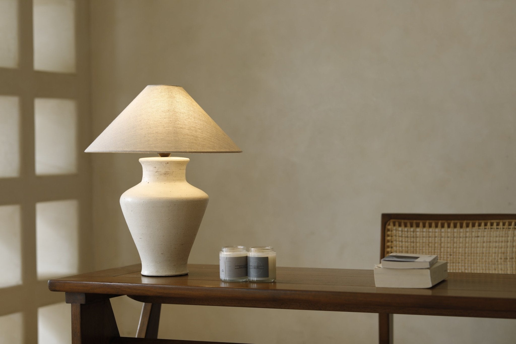 Cream Short Neck Lamp with clay base, linen shade, and modern design on wooden table