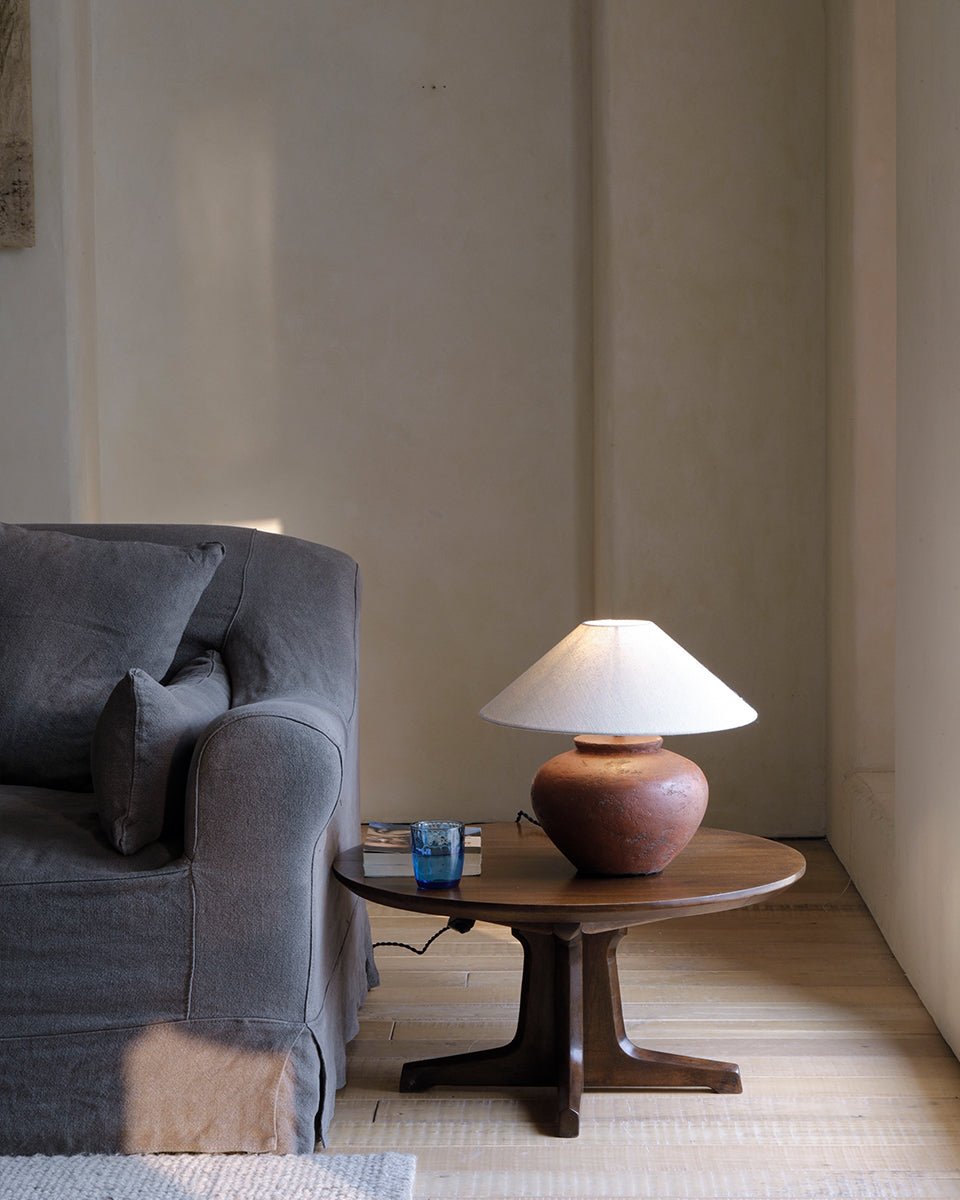 X Table with lamp and sofa, elegant design, Phoebe wood, natural light