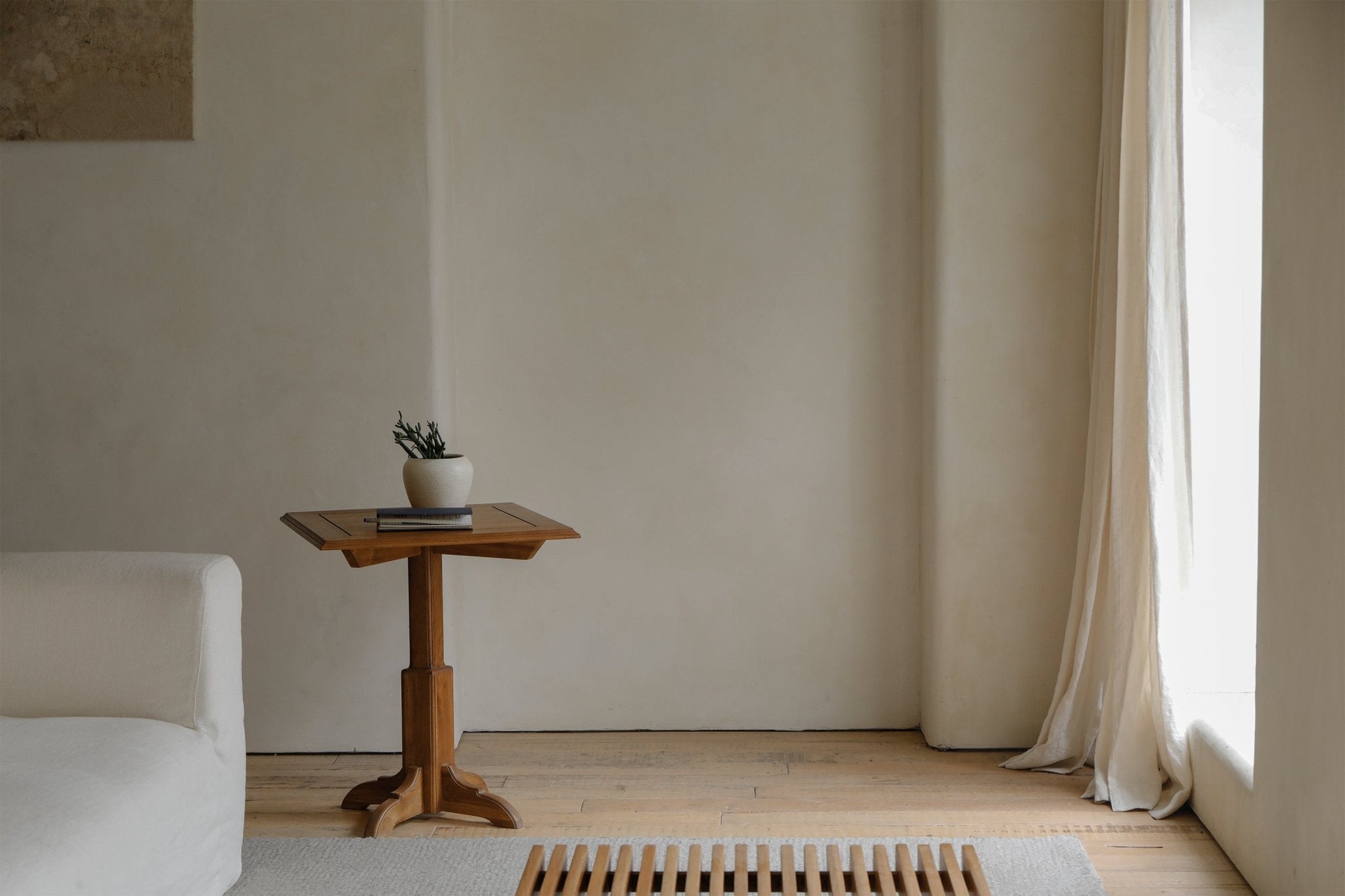 Square Indonesian teak side table with plant, modern minimalist interior design