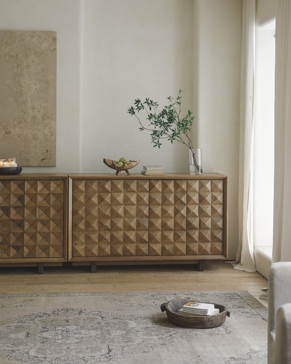 Bumpy Sideboard in reclaimed wood with geometric door design in a modern living room setting.