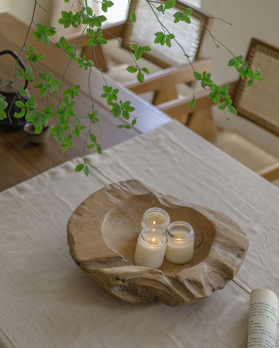 Indonesian Teak wooden platter with candles, handmade decorative display on the table, home decor.