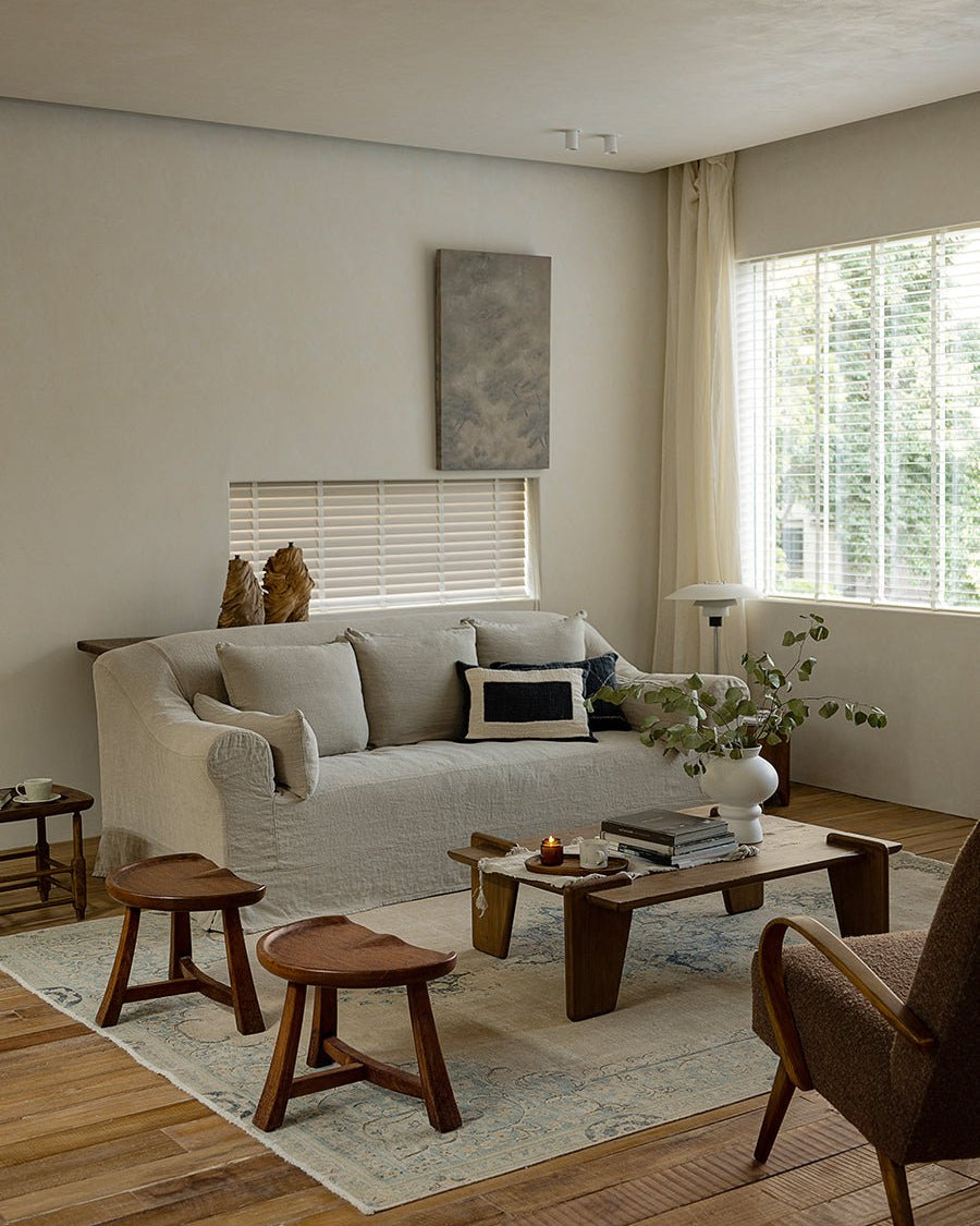 Durable teak wood Pod Stools with vintage design in living room.