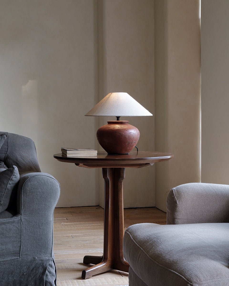 X Table side table with lamp, showcasing natural wood and elegant design